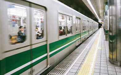 Train arriving at a platform in Kansai, Japan, for JR-West Kansai Rail Pass holders.