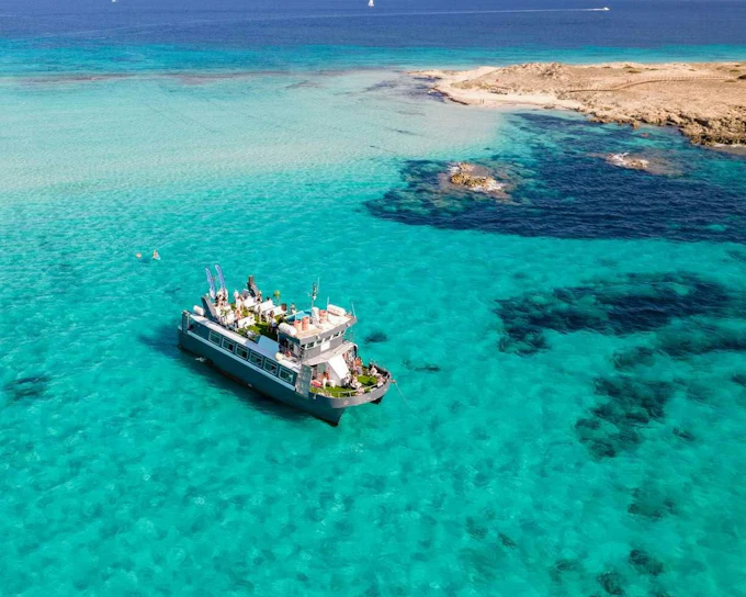 Ibiza: Full-day Formentera Cruise with Open Bar, Breakfast & Paella