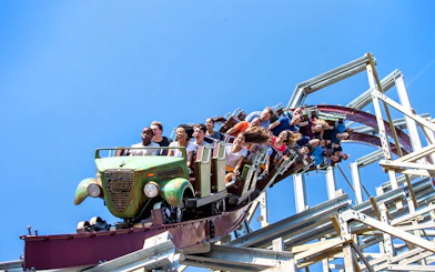 Riders on Twisted Timbers roller coaster at Six Flags King's Dominion.