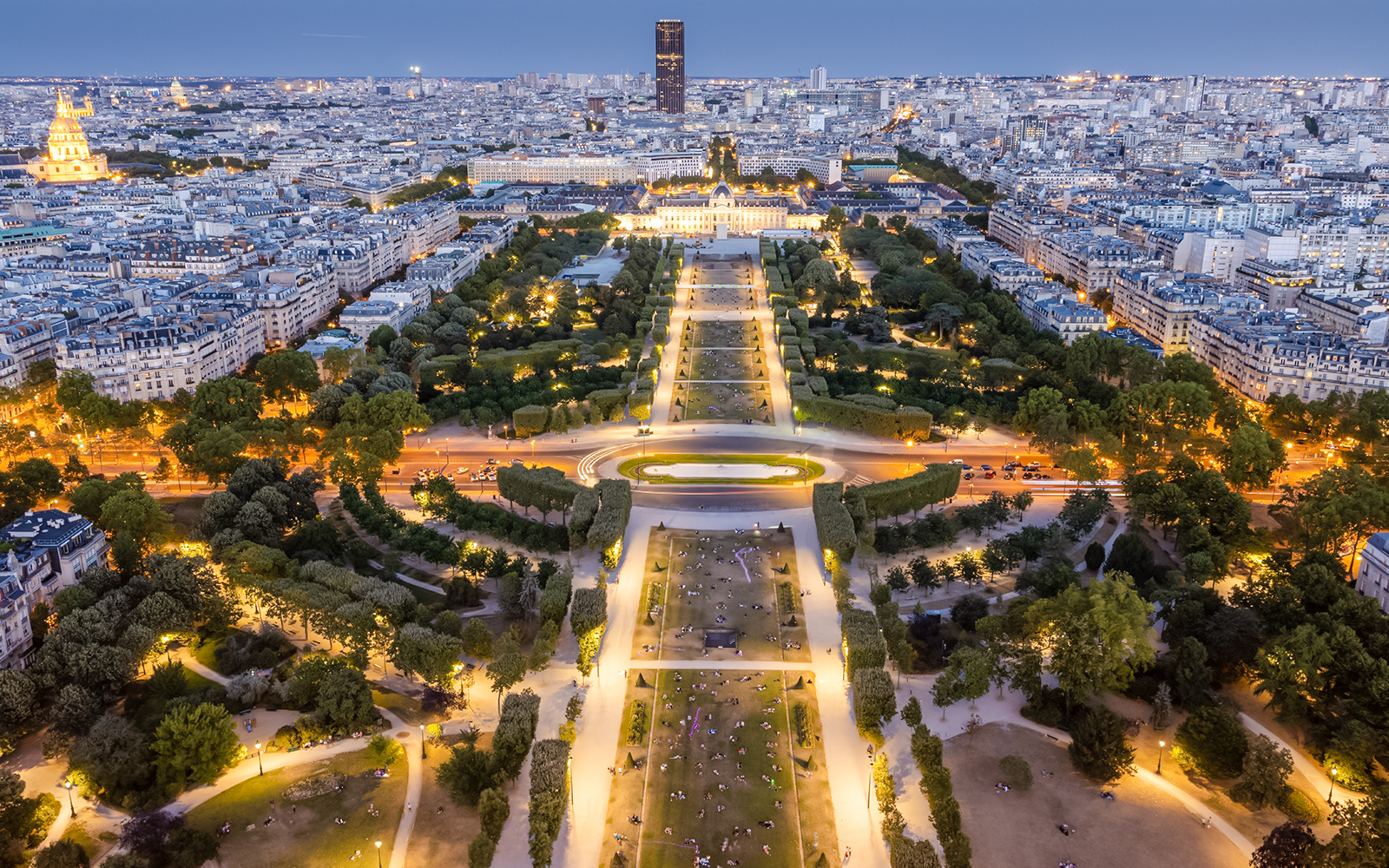 Aerial view of Champs de Mars illuminated at night in Paris, France.