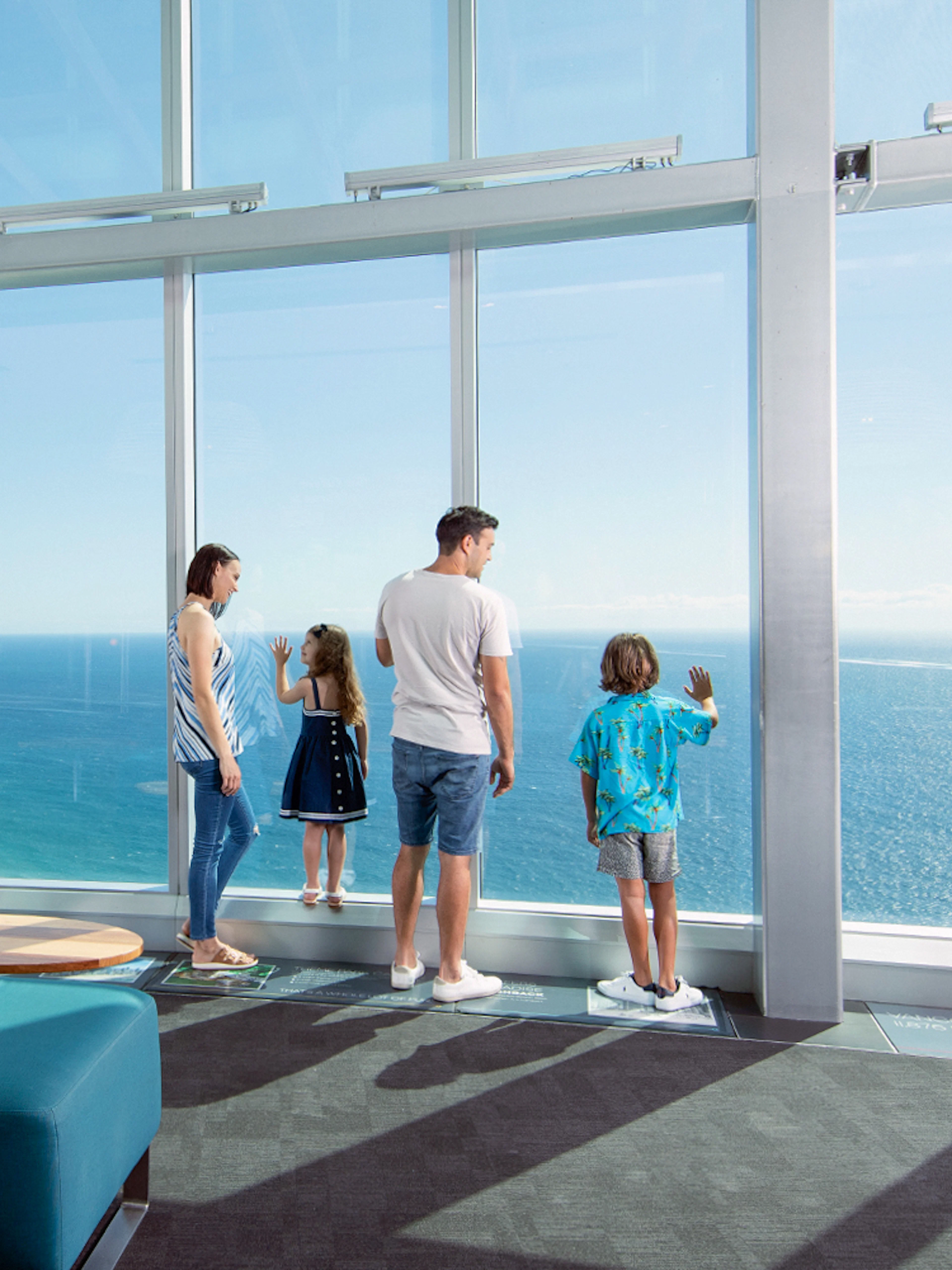 Visitors enjoying ocean views from SkyPoint Observation Deck, Gold Coast.