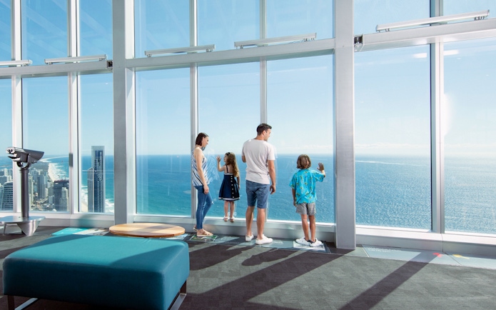 Visitors enjoying ocean views from SkyPoint Observation Deck, Gold Coast.