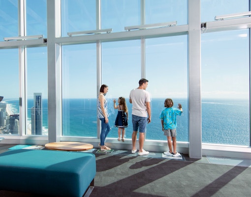 Visitors enjoying ocean views from SkyPoint Observation Deck, Gold Coast.