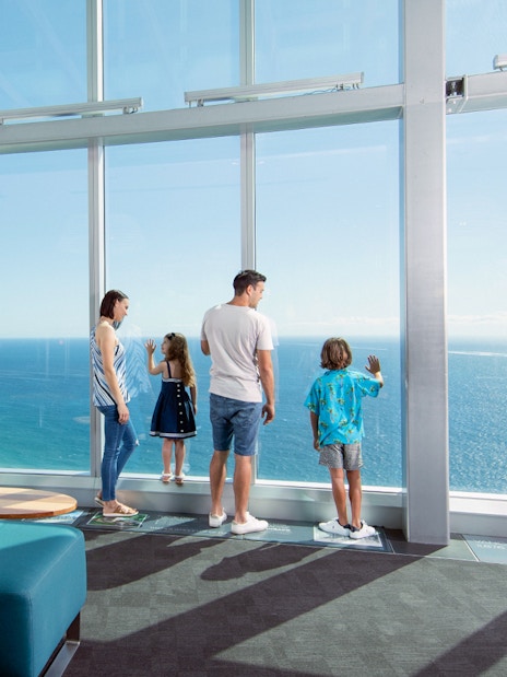Visitors enjoying ocean views from SkyPoint Observation Deck, Gold Coast.