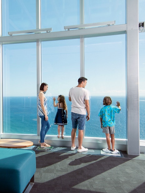 Visitors enjoying ocean views from SkyPoint Observation Deck, Gold Coast.