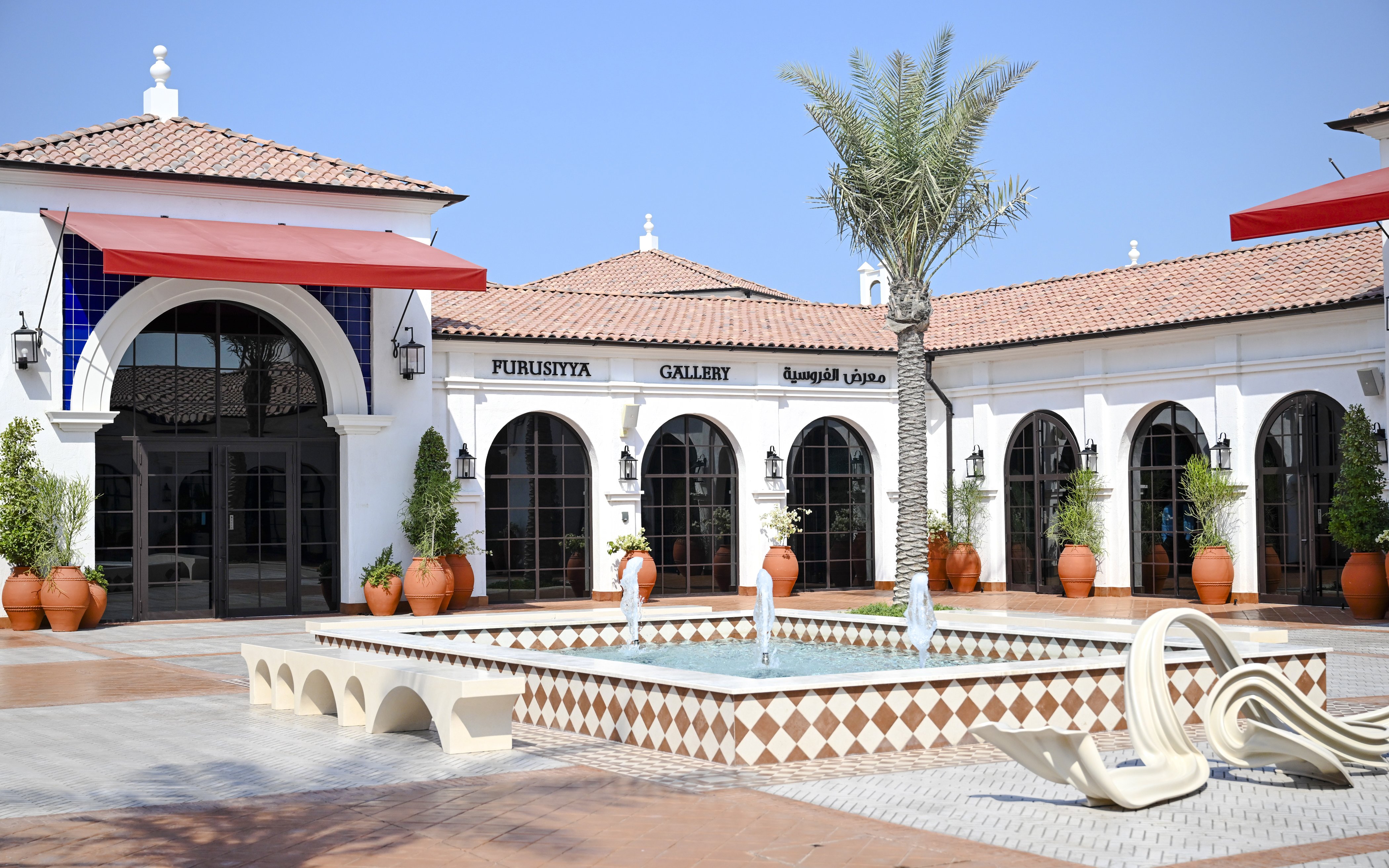 Furusiyya Gallery entrance with fountain, Abu Dhabi Royal Equestrian Arts tour.