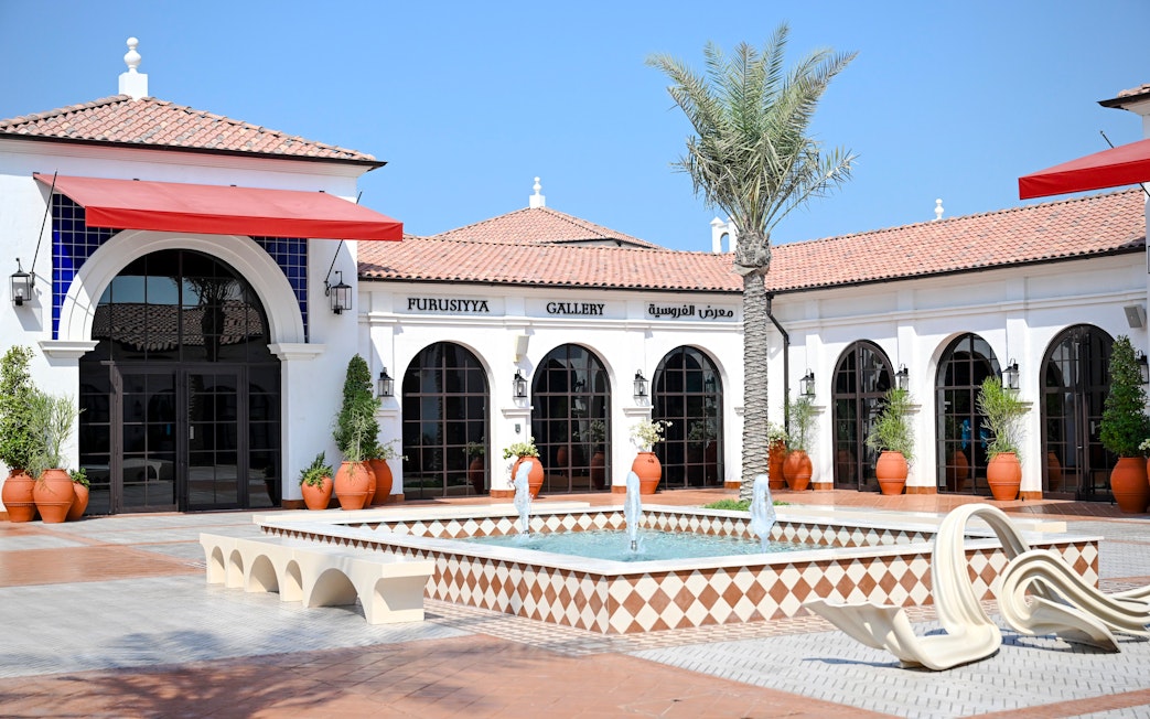 Furusiyya Gallery entrance with fountain, Abu Dhabi Royal Equestrian Arts tour.