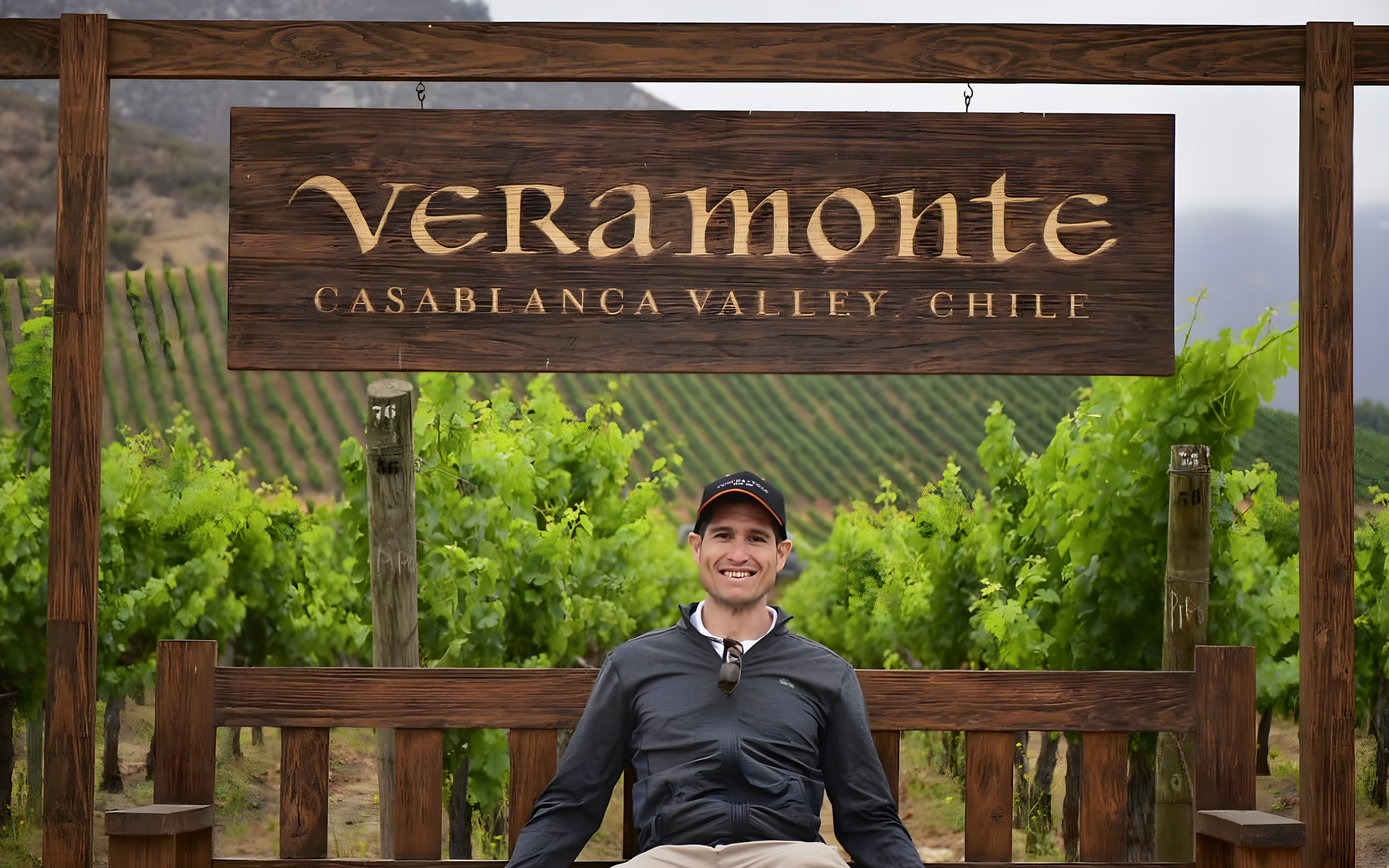 Tourist sitting at Veramonte vineyard, Casablanca Valley, Chile.