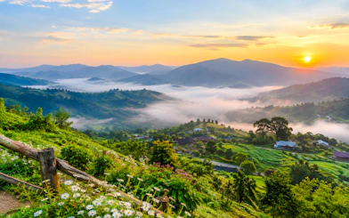 Scenic view of misty mountains and sunrise on the route from Chiang Mai to Mae Hong Son.