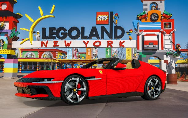 Lego Ferrari model at Legoland New York entrance.
