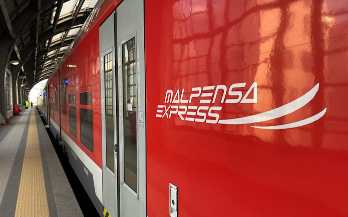 Malpensa Express train at Milan central station platform.