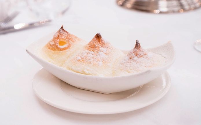 Salzburg dessert Salzburger Nockerl served in a white dish, part of a 3-course dinner.