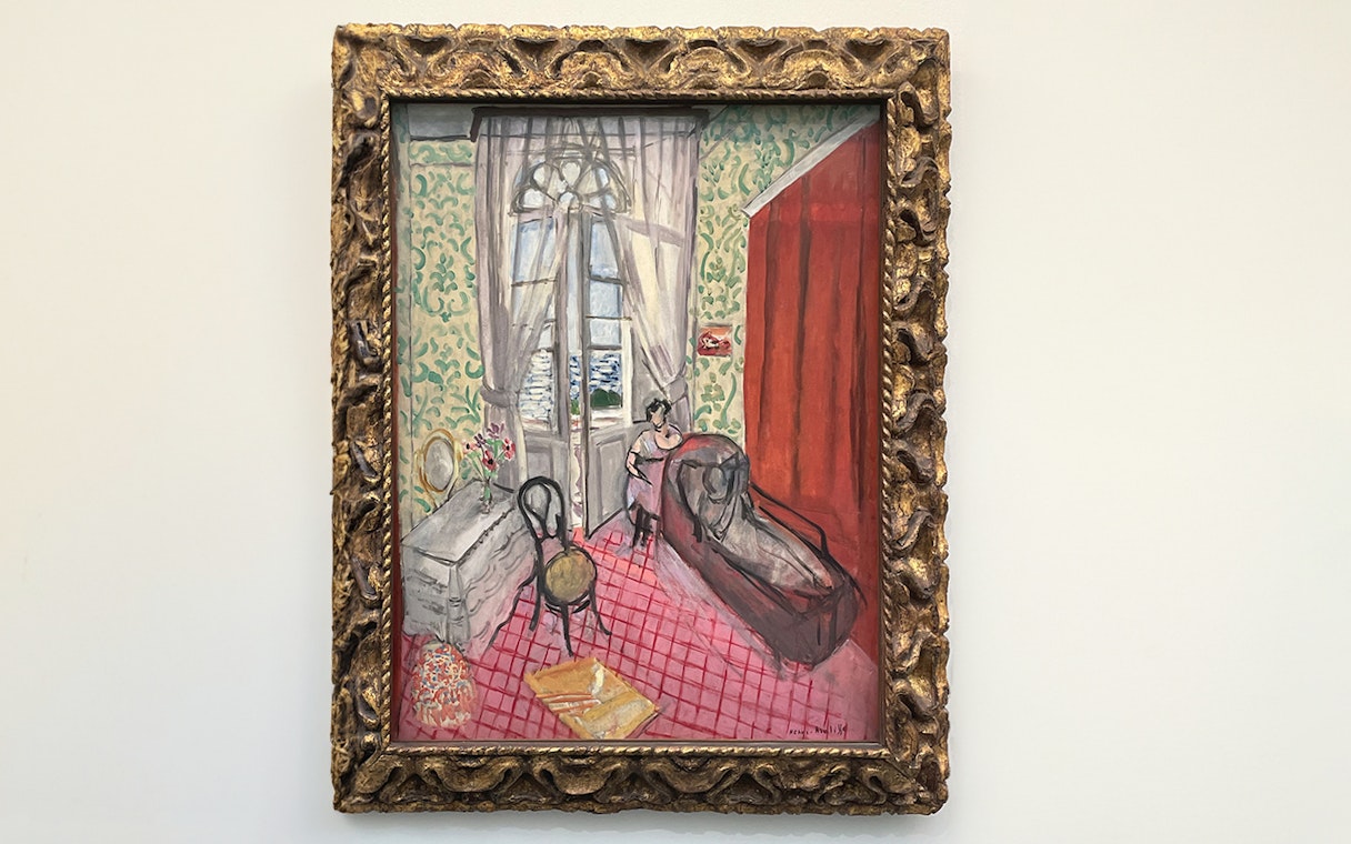 Boudoir painting at Orangerie Museum, Paris, featuring a woman by a window.