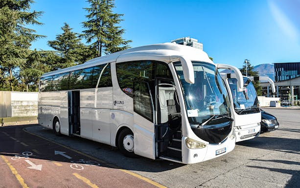 Bus at Tirana Airport for transfer to Tirana Central.