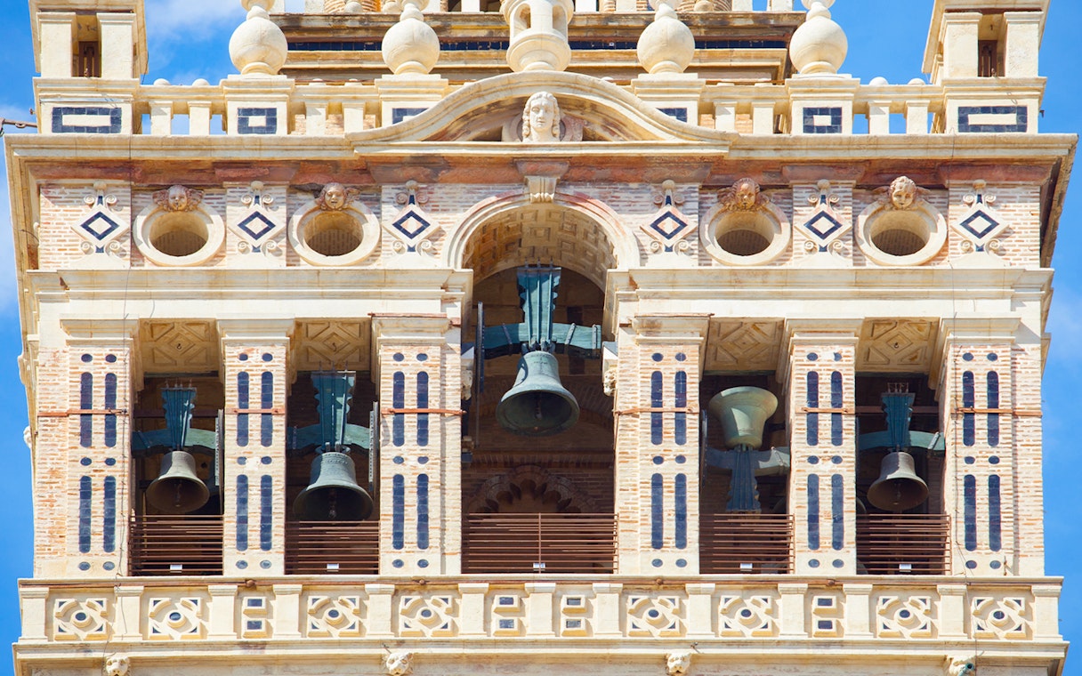 Bells in the belfry section of The Giralda tower, Seville, Spain.