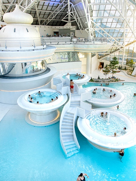 Caldea spa complex in Andorra with thermal pools and modern glass architecture.