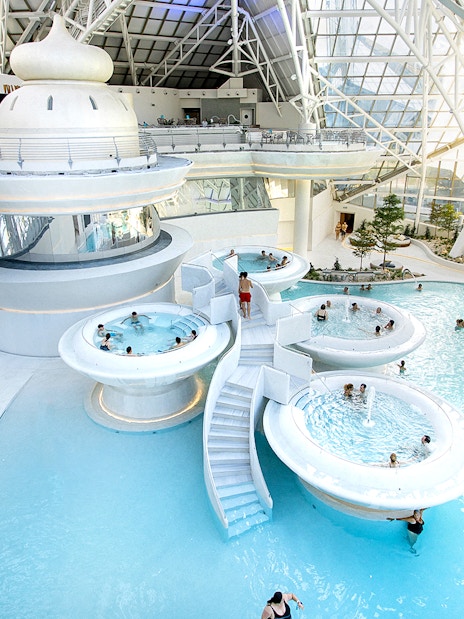Caldea spa complex in Andorra with thermal pools and modern glass architecture.