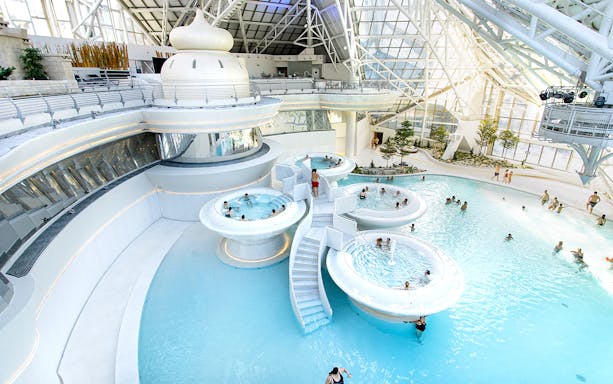 Caldea spa complex in Andorra with thermal pools and modern glass architecture.