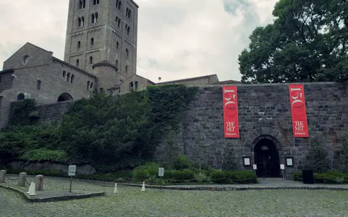 Met Cloisters entrance with medieval architecture, New York City.