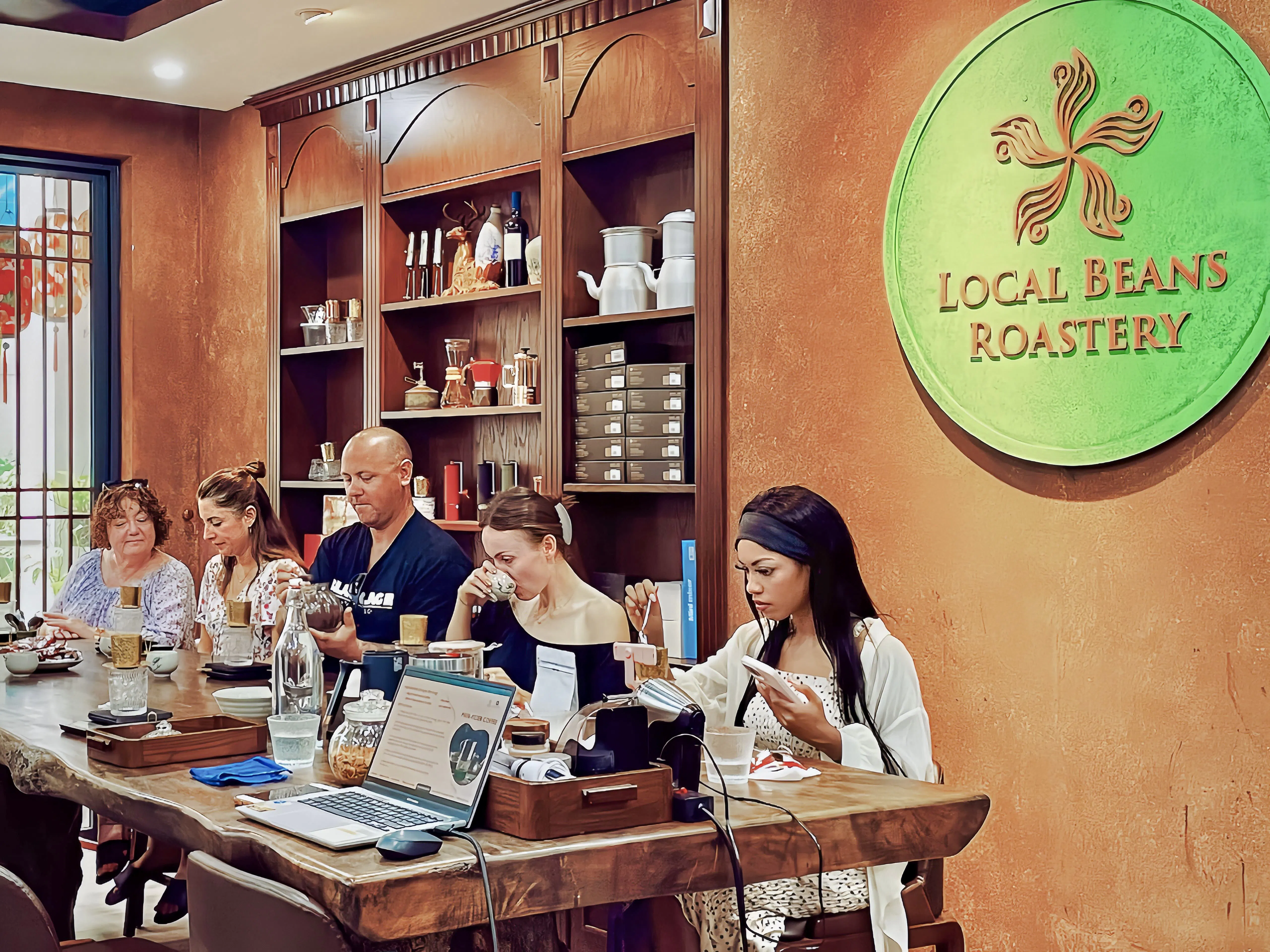 Participants brewing and tasting egg, coconut, and salt coffee at a Hanoi workshop.