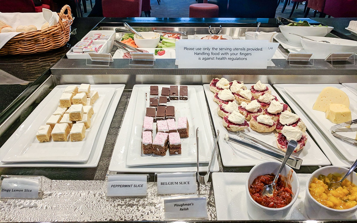 Assorted desserts and condiments at Plaza Premium Lounge buffet.