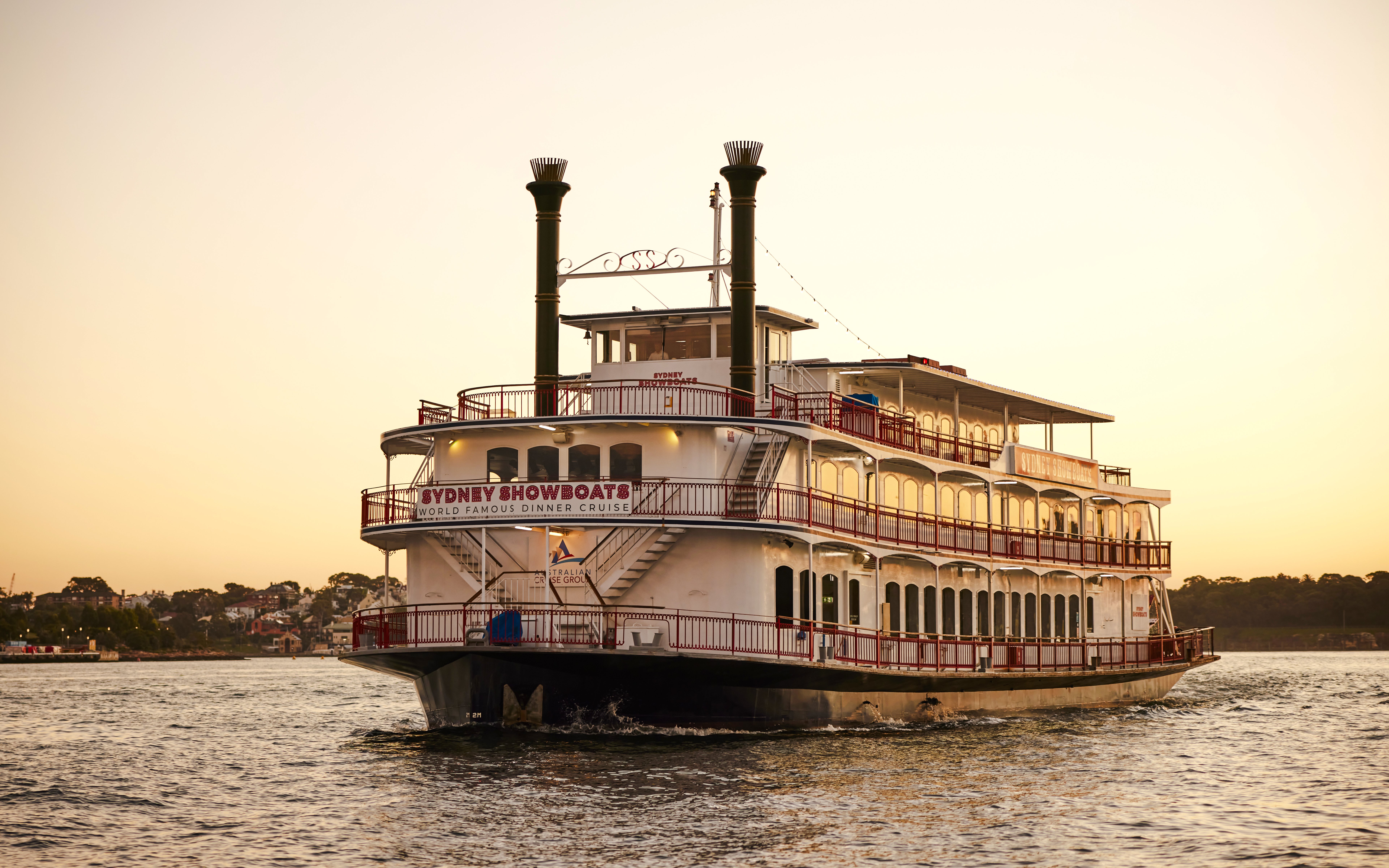 Showboat on Sydney Harbour during sunset for Vivid Sydney 3-hour dinner cruise with live cabaret.