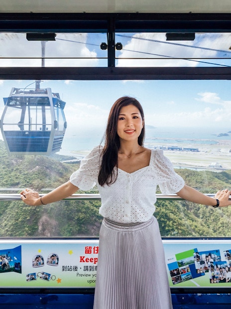 Ngong Ping Cable Car interior with view of Lantau Island, Hong Kong.