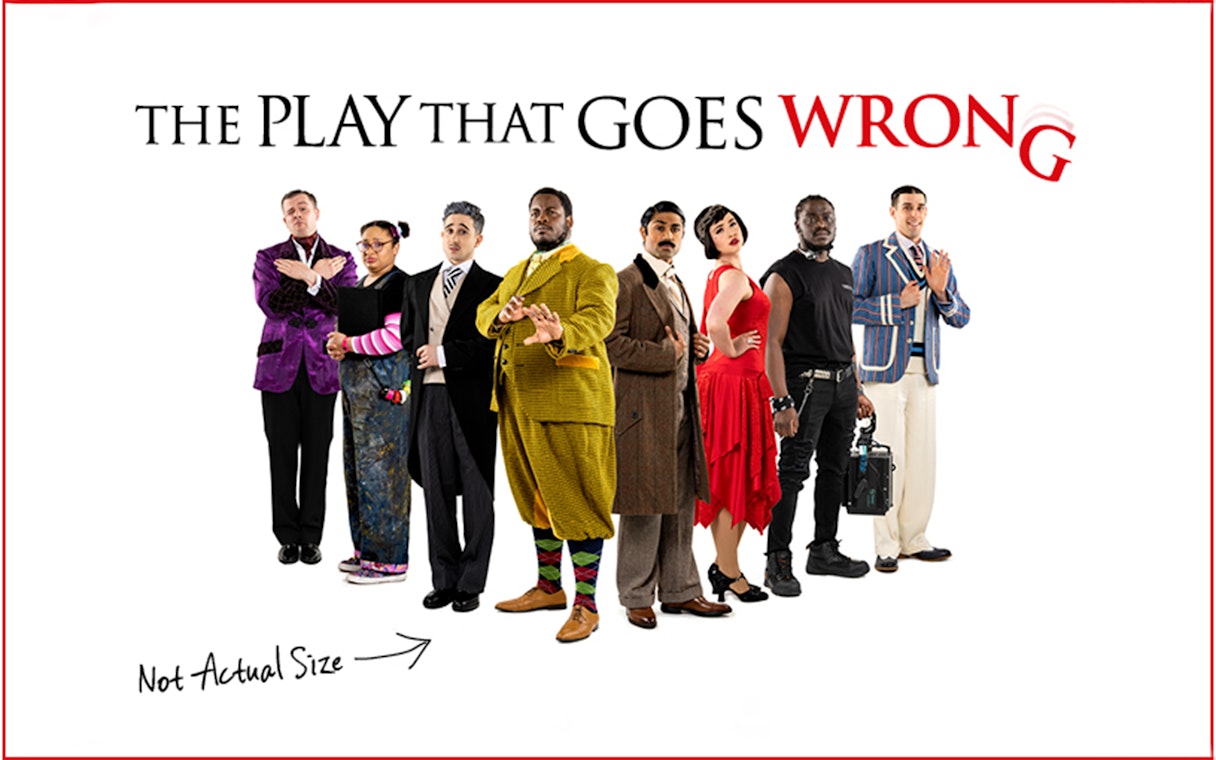 Cast of "The Play That Goes Wrong" in various costumes standing in a line.