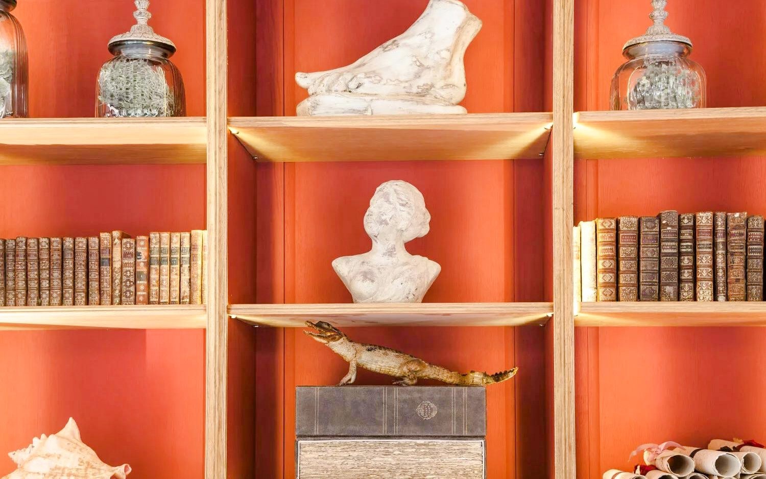 Bust sculpture and antique books on display at Caumont Centre d’Art.