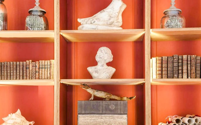 Bust sculpture and antique books on display at Caumont Centre d’Art.