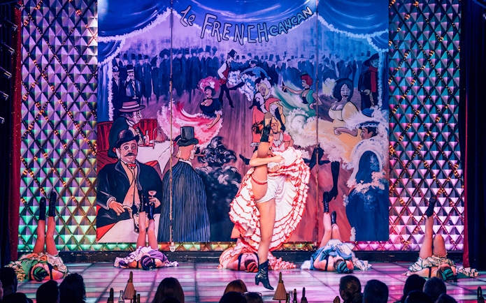 Cabaret La Nouvelle Eve dancers performing French cancan in Paris.
