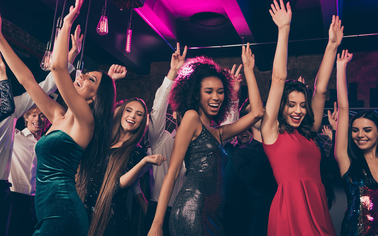 A group pf friends partying late night in a club