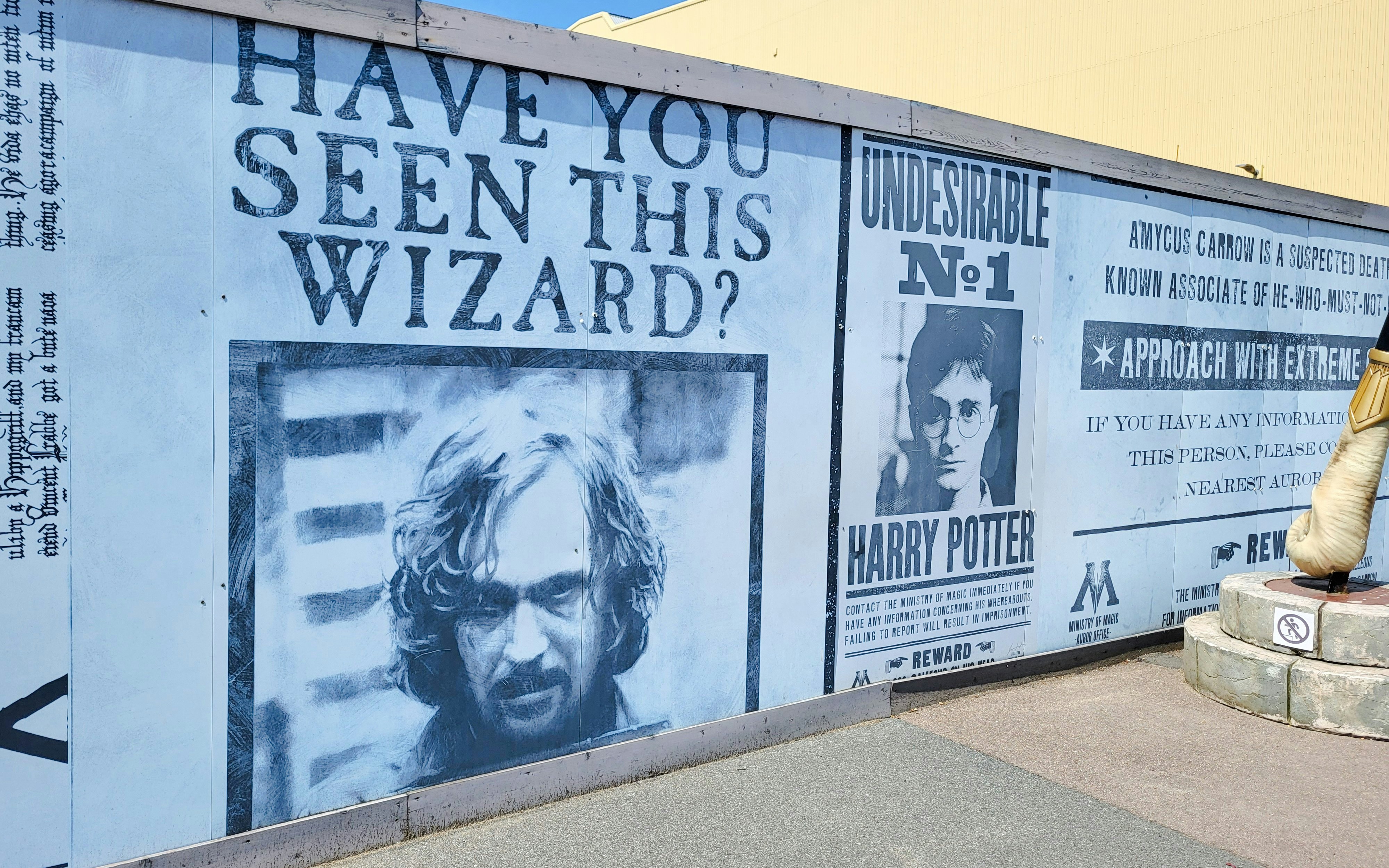 Wanted posters for Sirius Black and Harry Potter at the Ministry of Magic attraction.