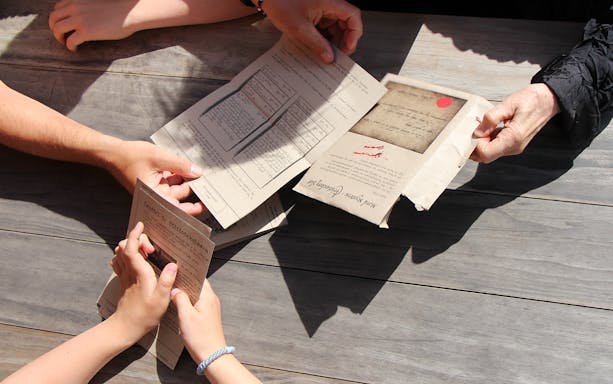 Participants examining clues for Murder Mystery at Round Tower, Copenhagen.