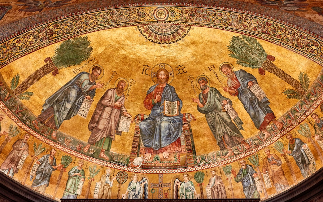 Mosaic of Christ with apostles at St Paul Cathedral, featuring intricate gold background.