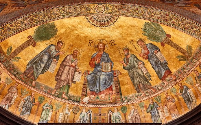 Mosaic of Christ with apostles at St Paul Cathedral, featuring intricate gold background.