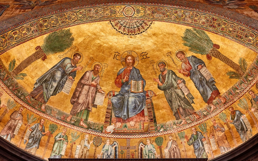 Mosaic of Christ with apostles at St Paul Cathedral, featuring intricate gold background.