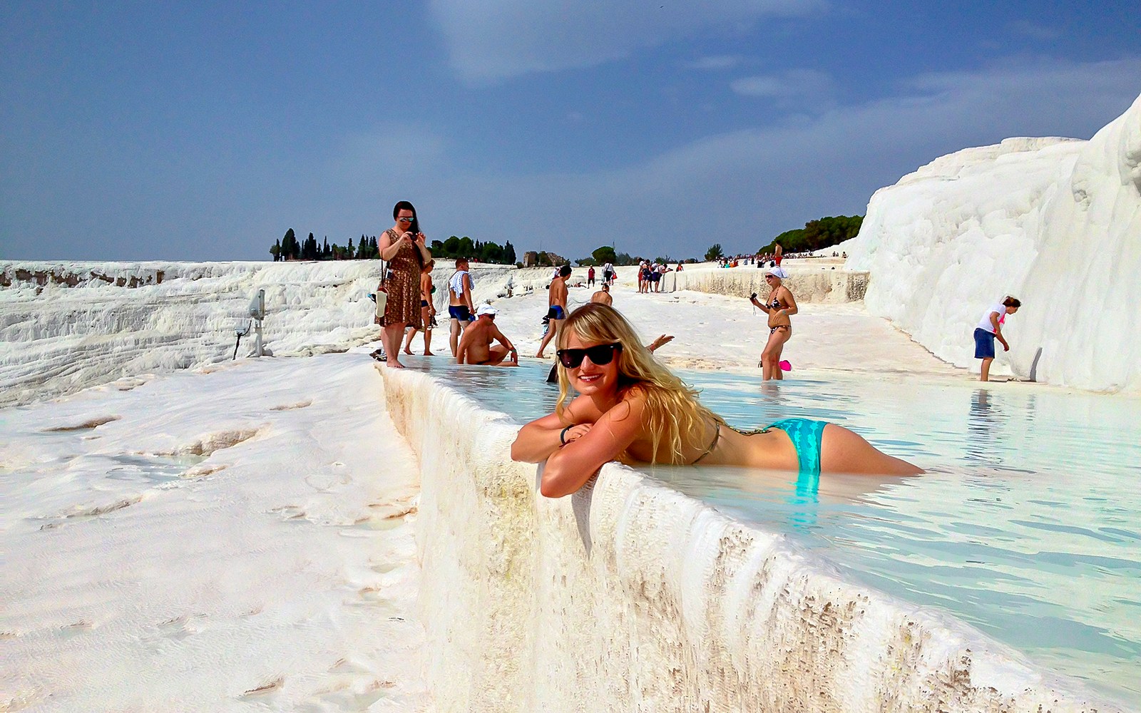Guests relaxing in the thermal pools of Pamukkale, Turkey.