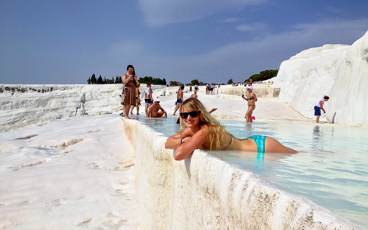 Guests relaxing in the thermal pools of Pamukkale, Turkey.