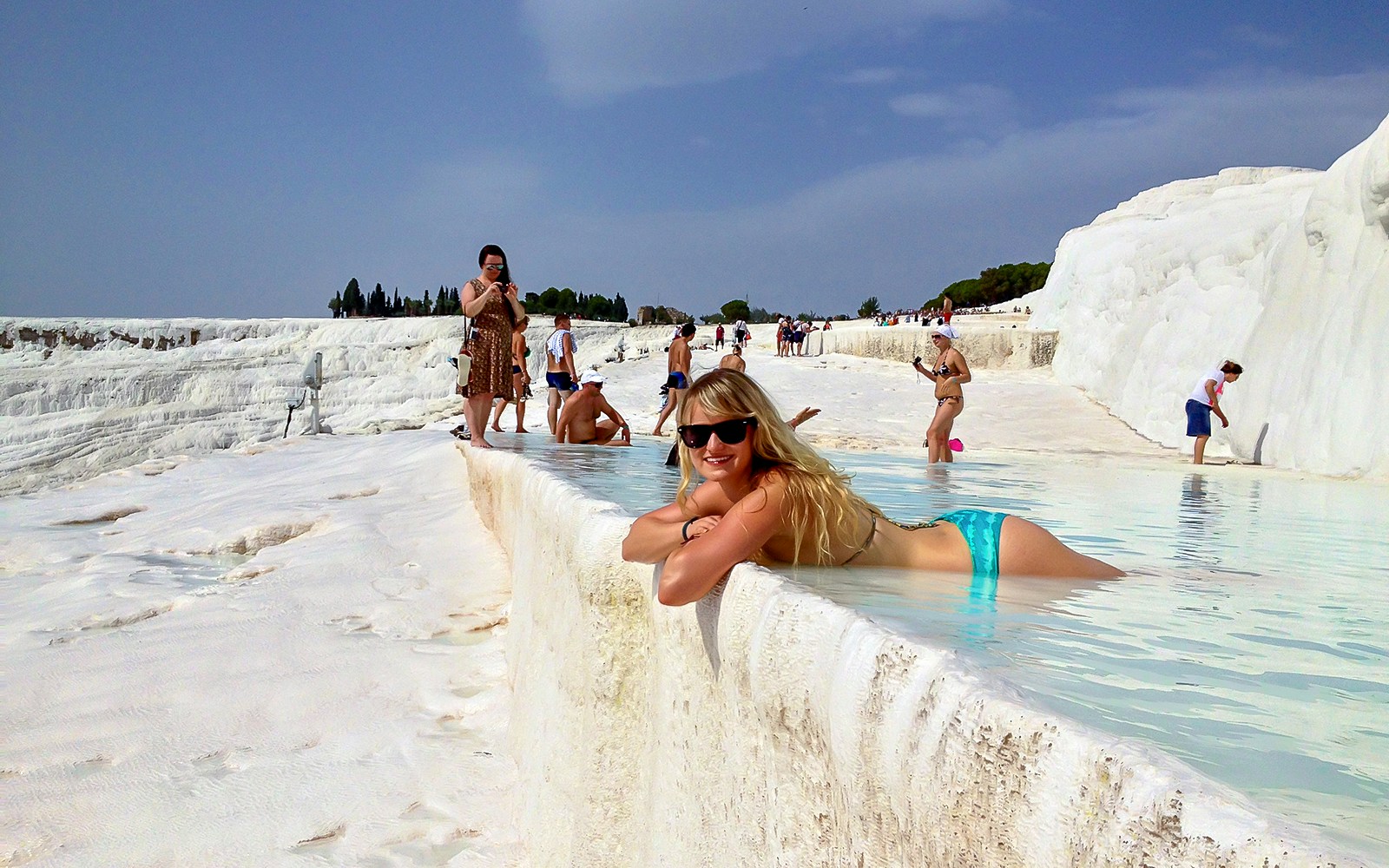 Guests relaxing in the thermal pools of Pamukkale, Turkey.