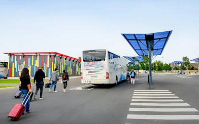 Passengers boarding Aerobus at Beauvais Airport for Paris Saint-Denis University.