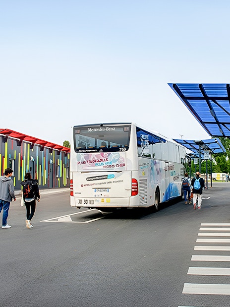 Passengers boarding Aerobus at Beauvais Airport for Paris Saint-Denis University.