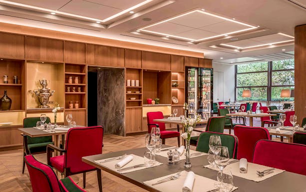 Elegant dining room set for a 3-course dinner at Mirabell Palace.