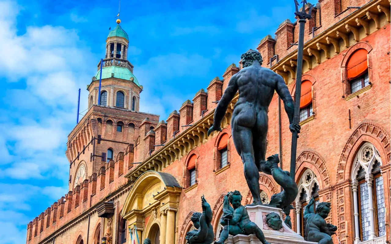Neptune Fountain and Palazzo Re Enzo in Bologna, Italy.