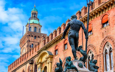 Neptune Fountain and Palazzo Re Enzo in Bologna, Italy.