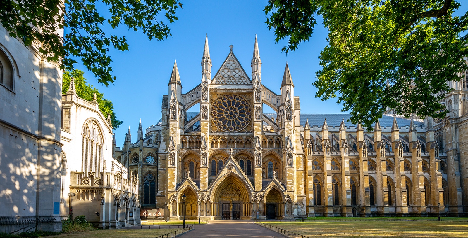 Westminster Abbey facade with intricate Gothic architecture in London.