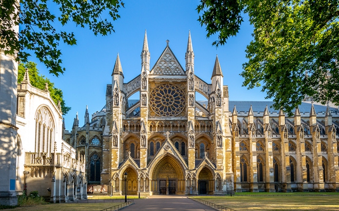 Westminster Abbey facade with intricate Gothic architecture in London.
