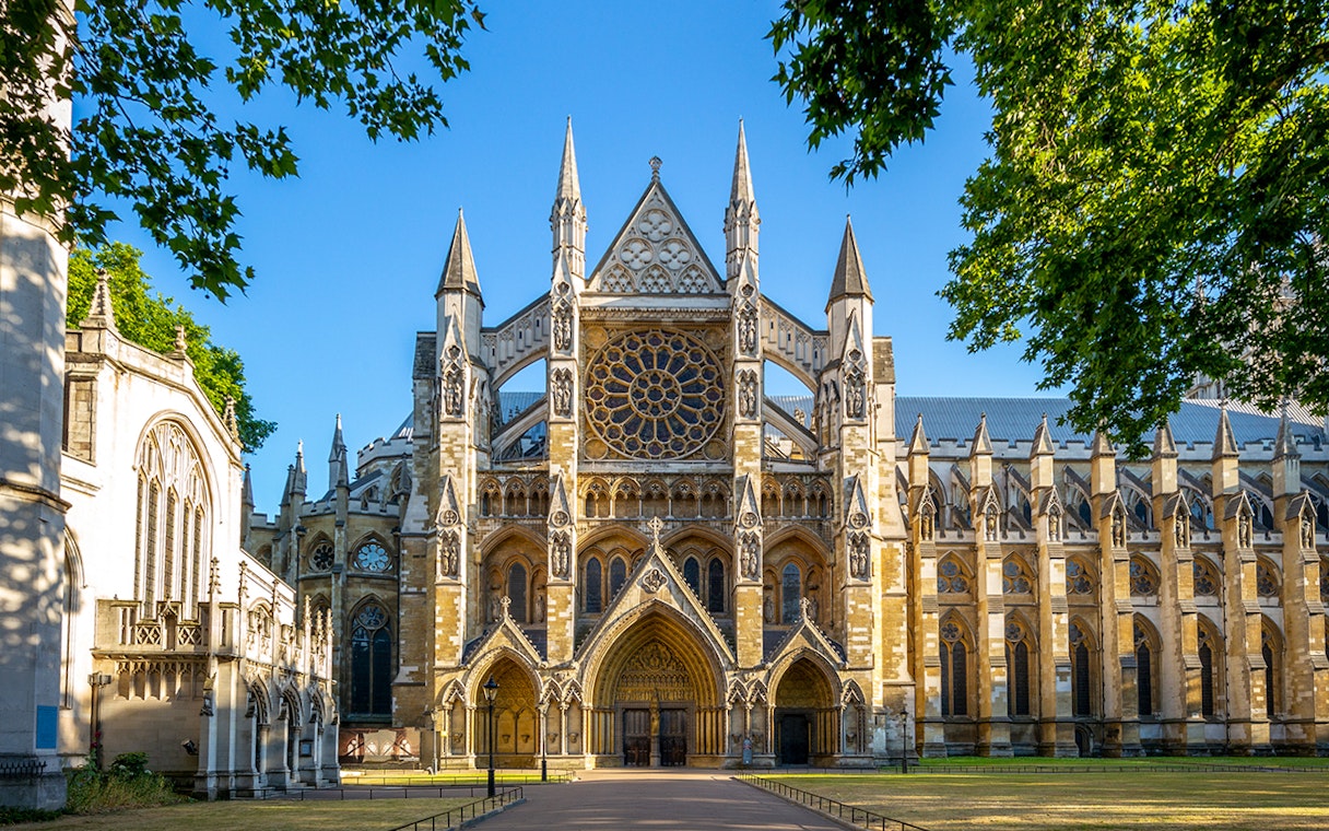 Westminster Abbey facade with intricate Gothic architecture in London.