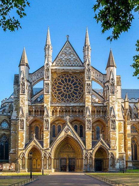 Westminster Abbey facade with intricate Gothic architecture in London.