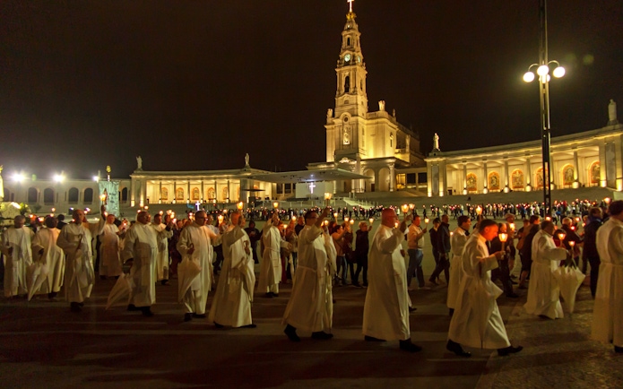 Candle procession during Fatima night pilgrimage tour at the Sanctuary of Our Lady of Fatima.